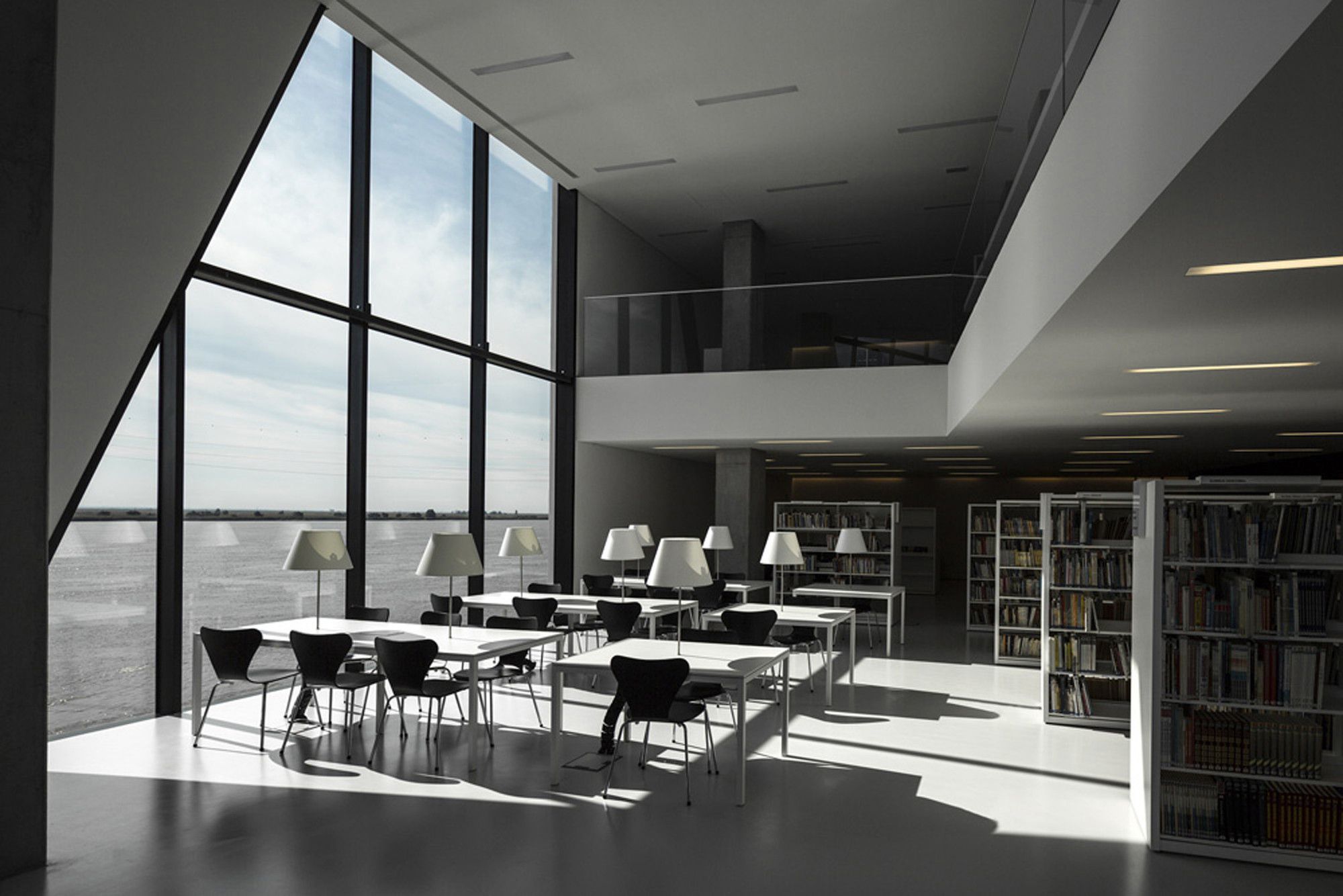 Sala de leitura da Biblioteca Municipal de Vila Franca de Xira – Fábrica das Palavras, com mesas e estantes Culturalis